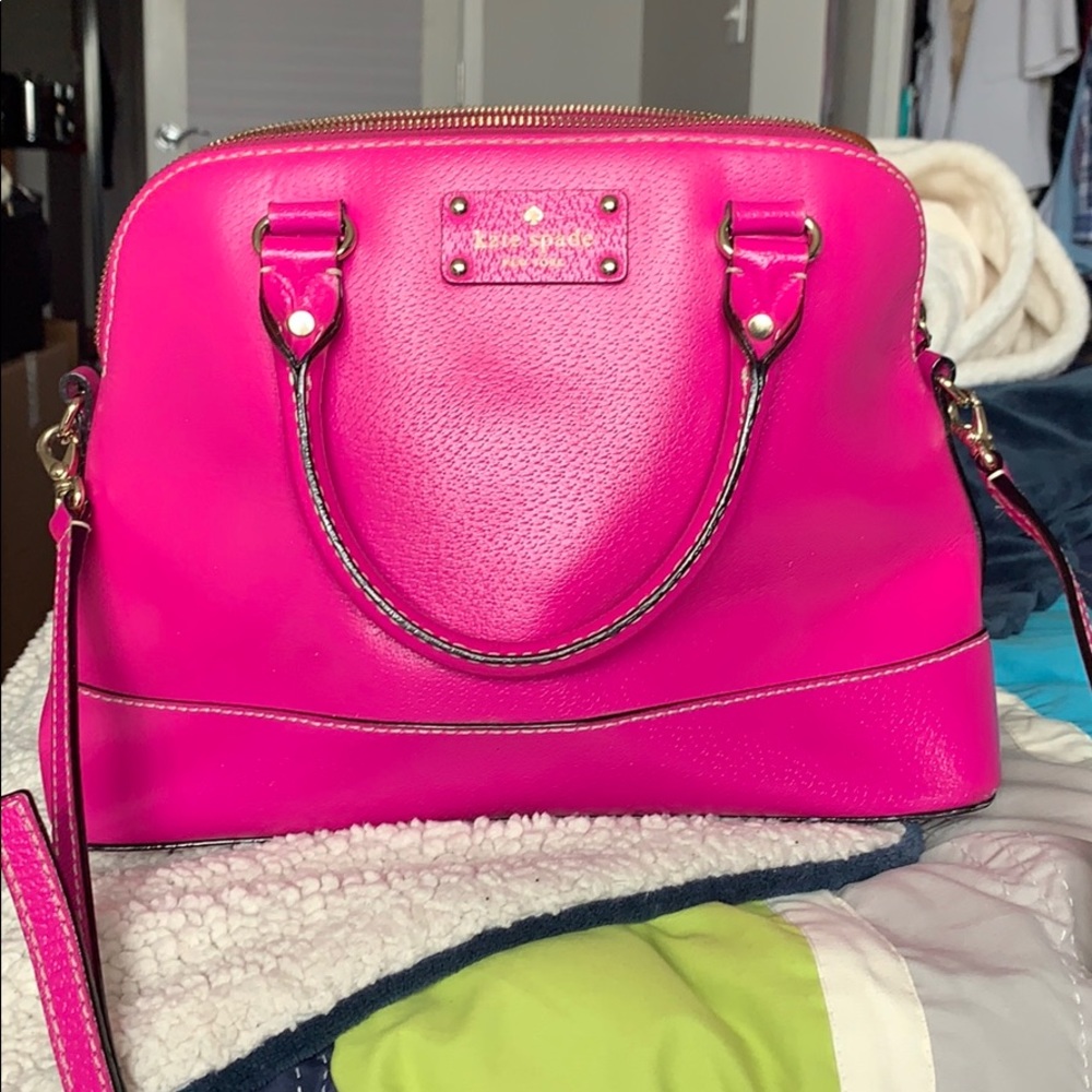 Pink Kate Spade hand bag with adjustable strap